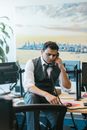 Man Talking on the Telephone