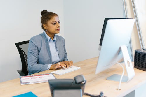 Free Woman Busy Working in Her Office Stock Photo