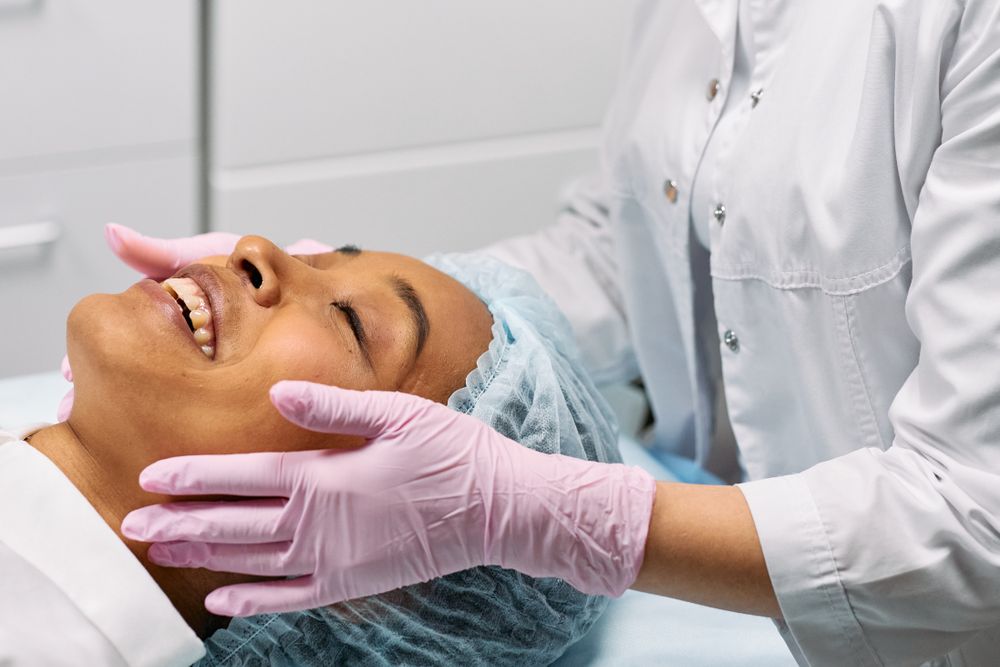 Client receiving a treatment in a calm clinic room