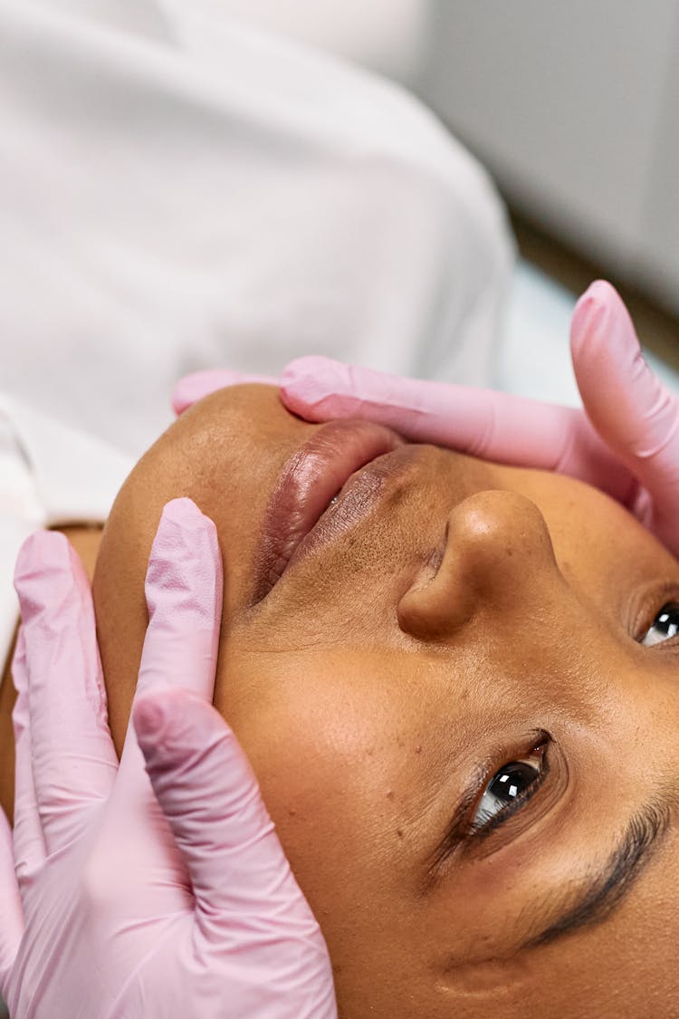 A Woman Having A Facial Treatment