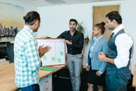 People in a Meeting while Standing