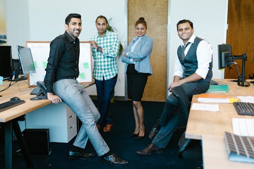 Free People Standing Inside an Office Stock Photo