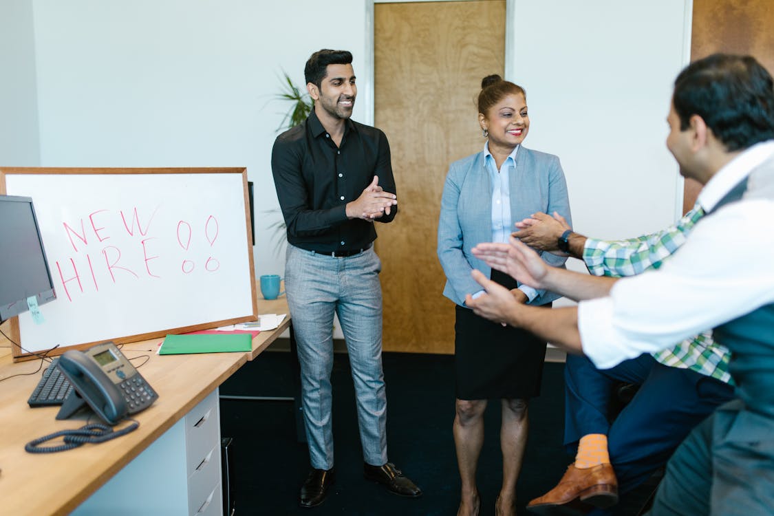 Free People Clapping for a Woman Stock Photo