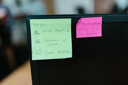 Free Sticky Notes Stuck on a Monitor Stock Photo