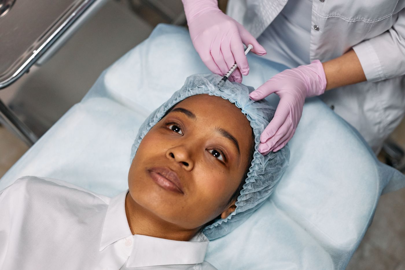 Patient receiving a cosmetic injection treatment