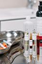 Clear Glass Bottles on Stainless Steel Bowl