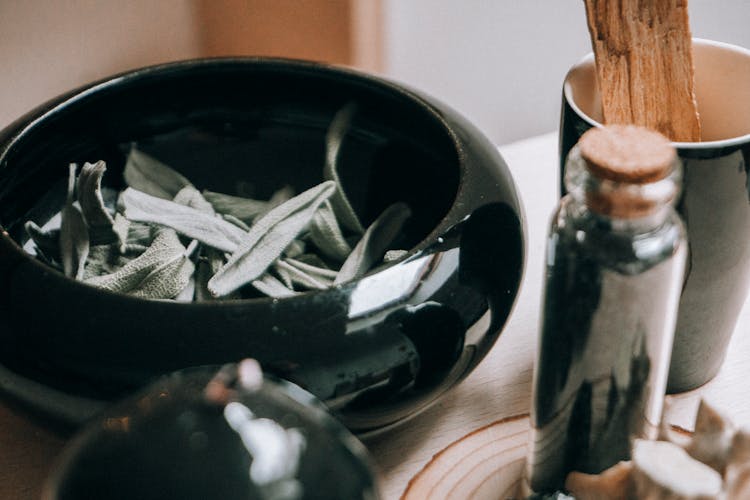 Ceramic Black Bowl Filled With Sage Leaves