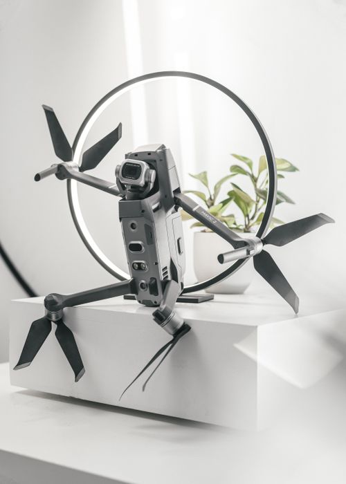 Free Close-up view of a futuristic drone with a ring backdrop, showcasing modern technology. Stock Photo