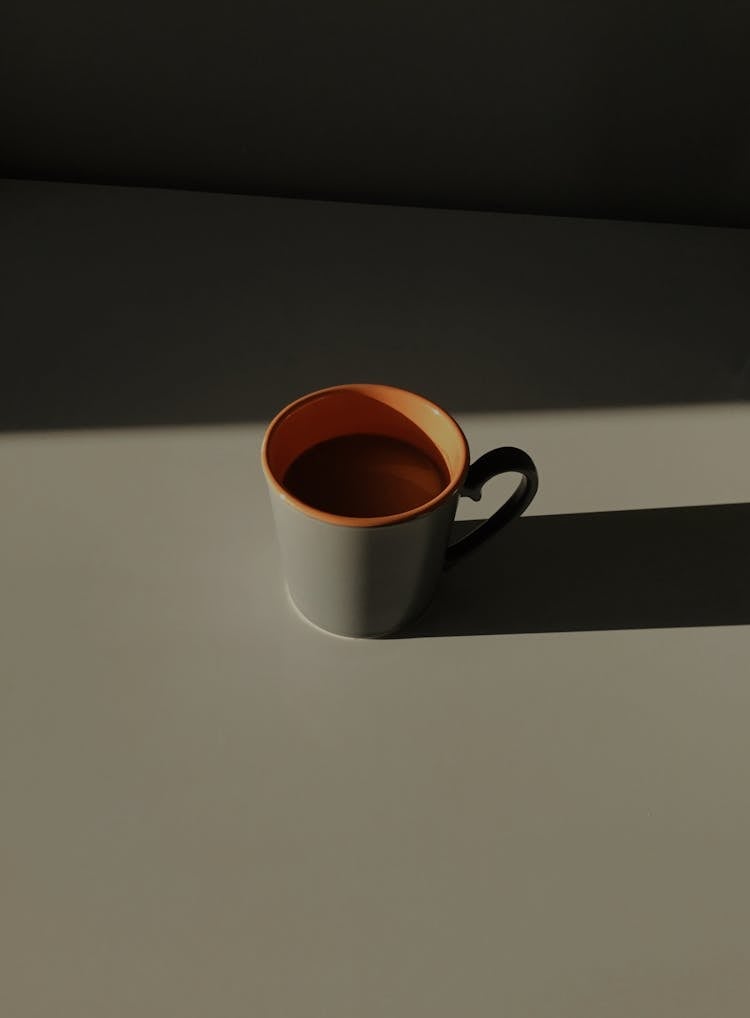 Cup Of Hot Cocoa In Sunlight