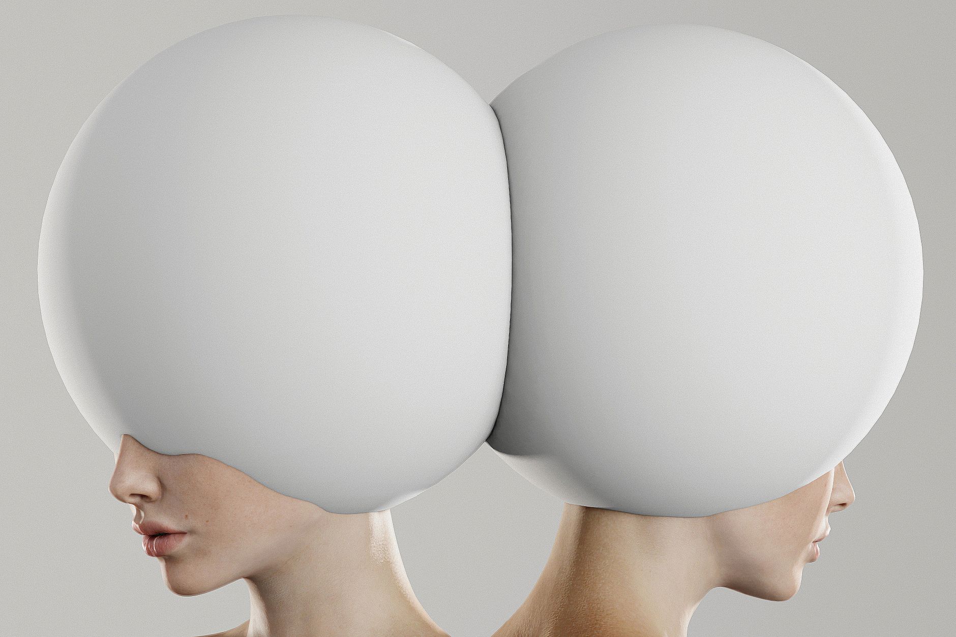 Two women with large abstract helmets portraying conceptual duality and symmetry.