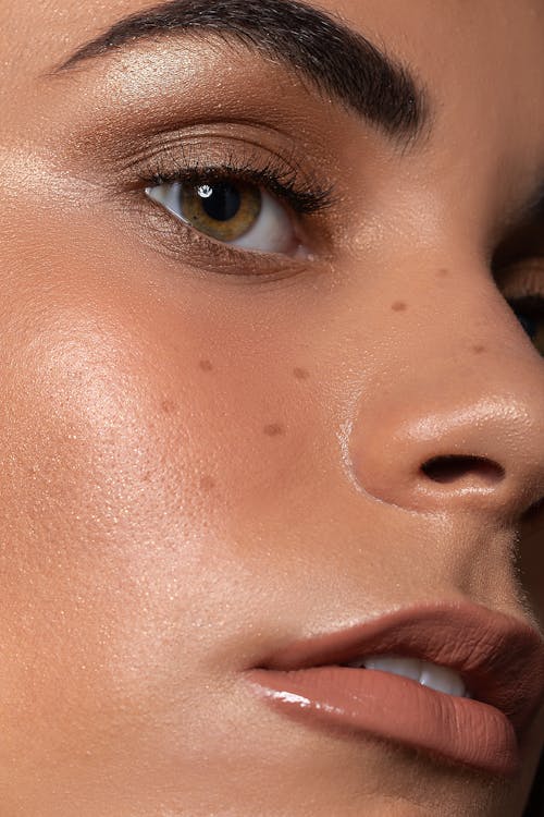 Close-up Portrait of a Face of a Model Wearing Makeup 