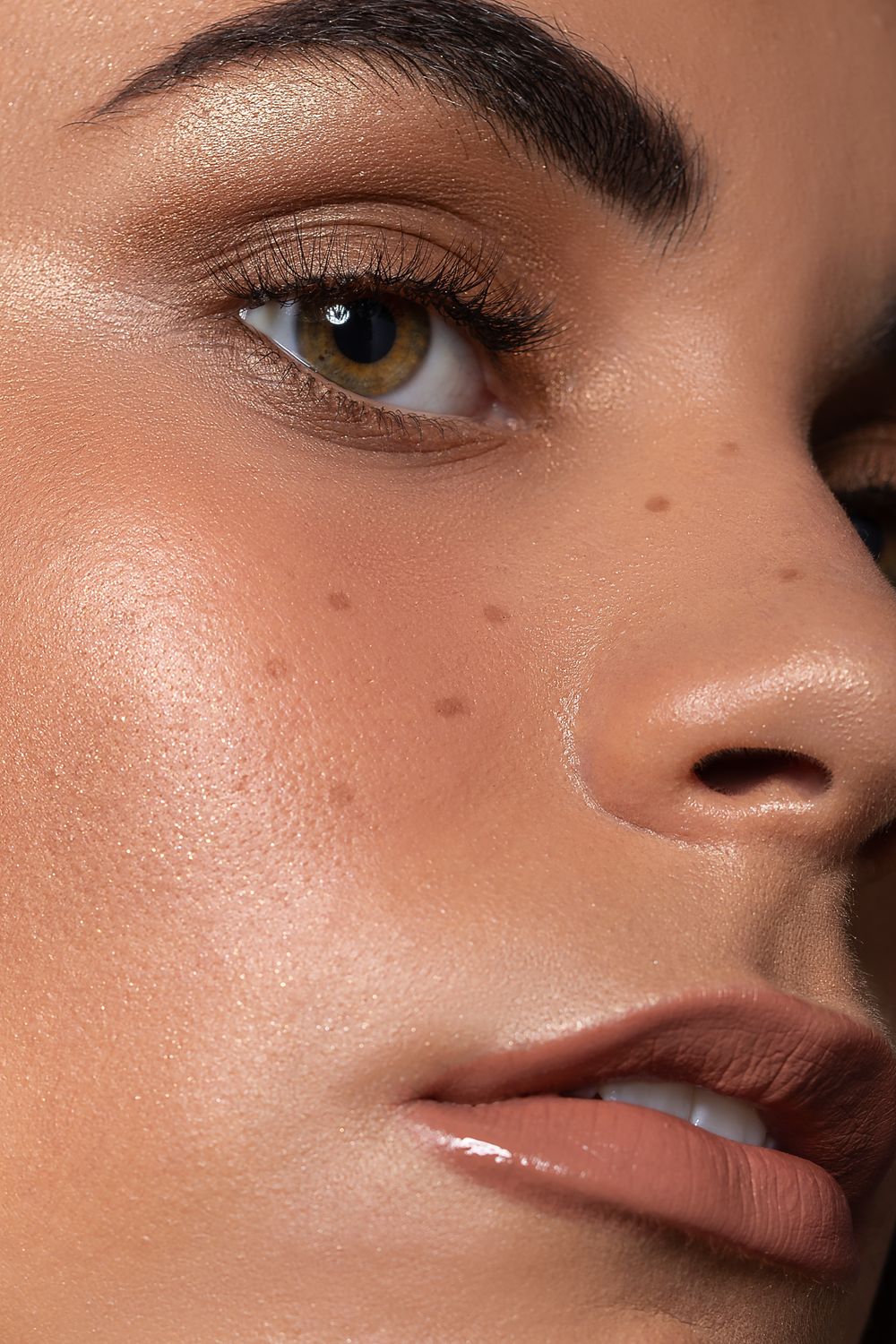 Close-up of skin shown with a duller, less even finish