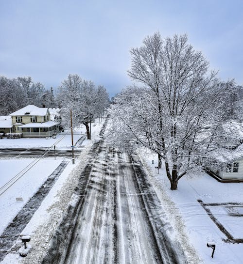 Street in the Suburbs After Snow Plows Pass