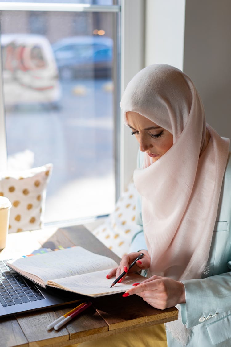 Woman Wearing Hijab In The Office