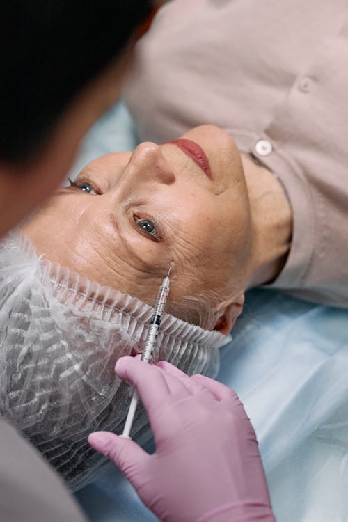 Close-up of Elderly Woman Getting Botox 