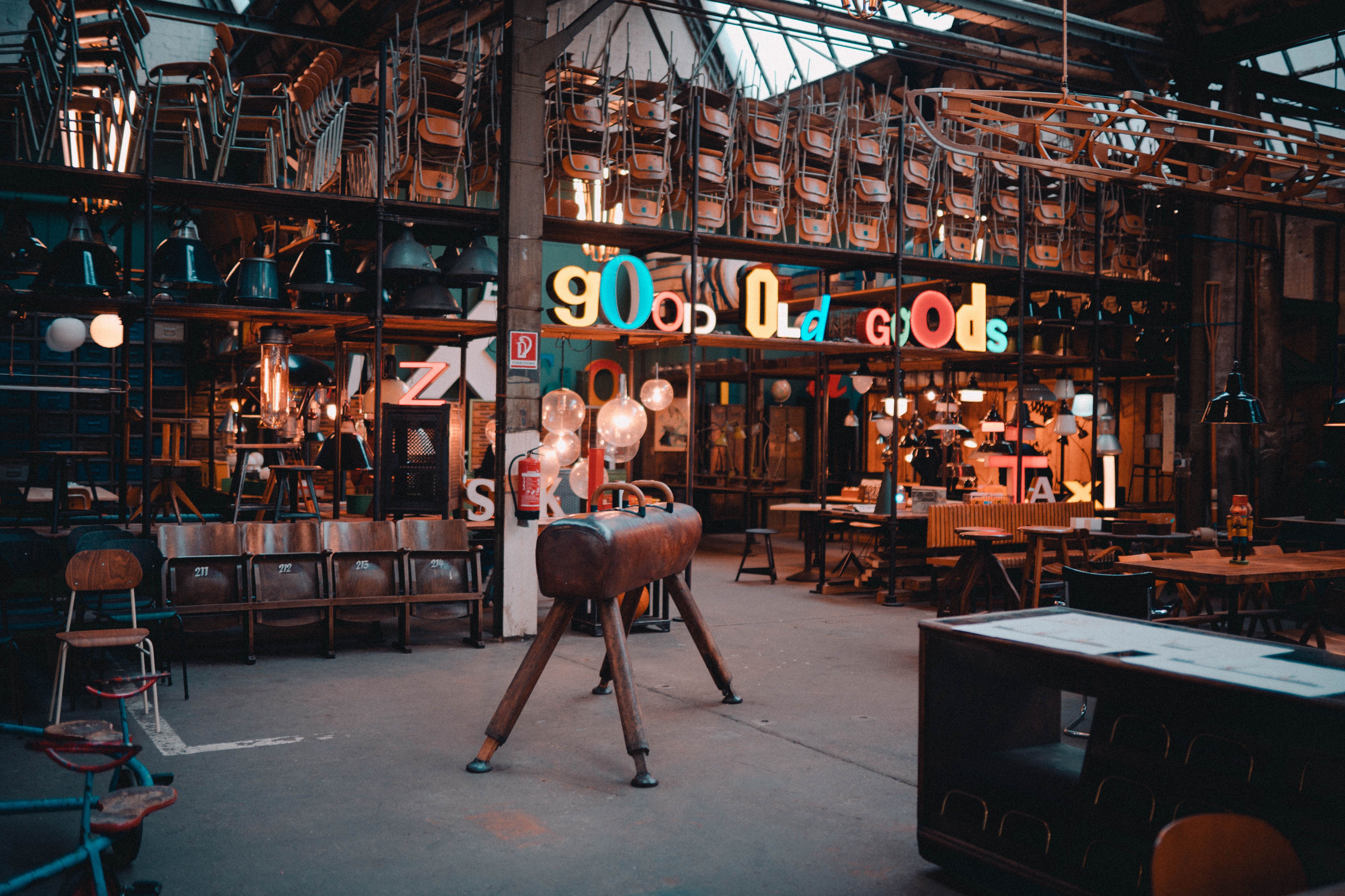Explore a rustic industrial loft with vintage decor and ambient lighting in Berlin.