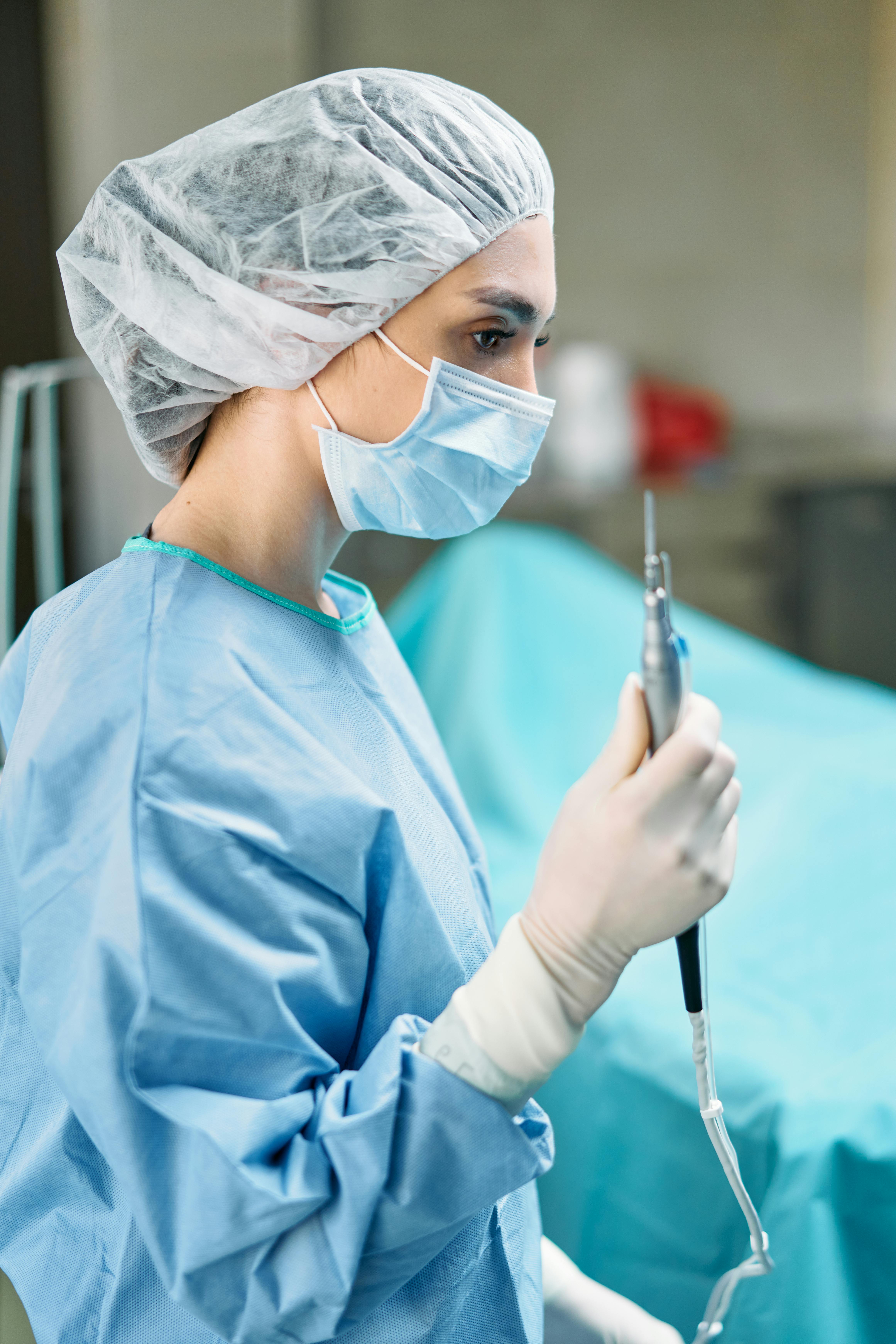 female surgeon operating