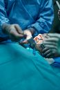 Hands of a Person Holding Medical Tools on a Woman's Open Mouth