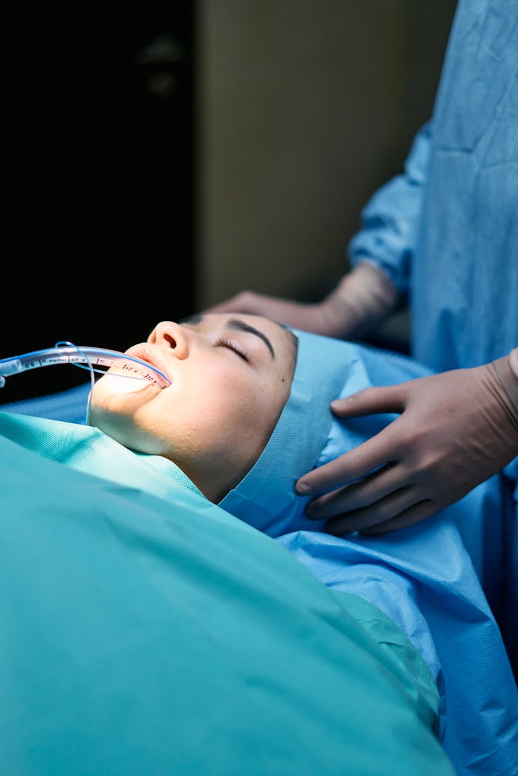 A Patient With A Tube In Mouth