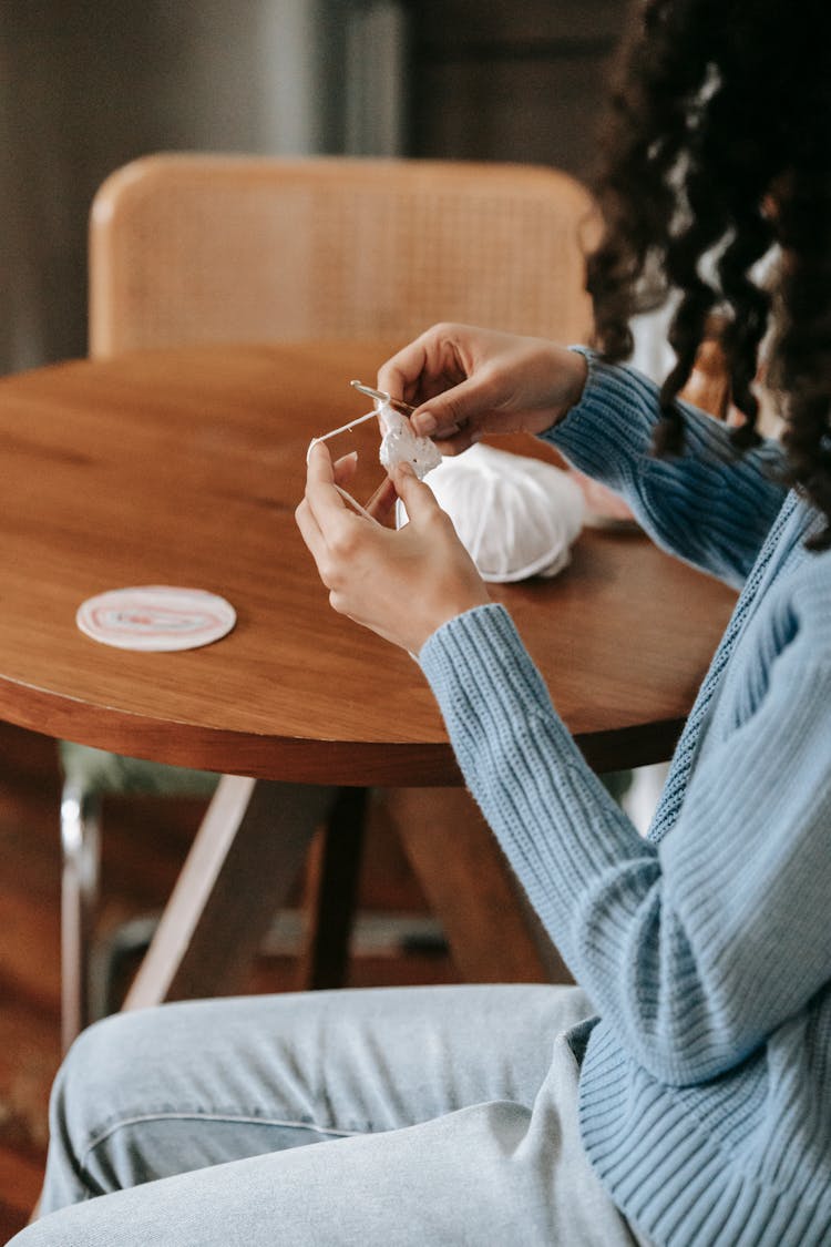 A Woman Crocheting