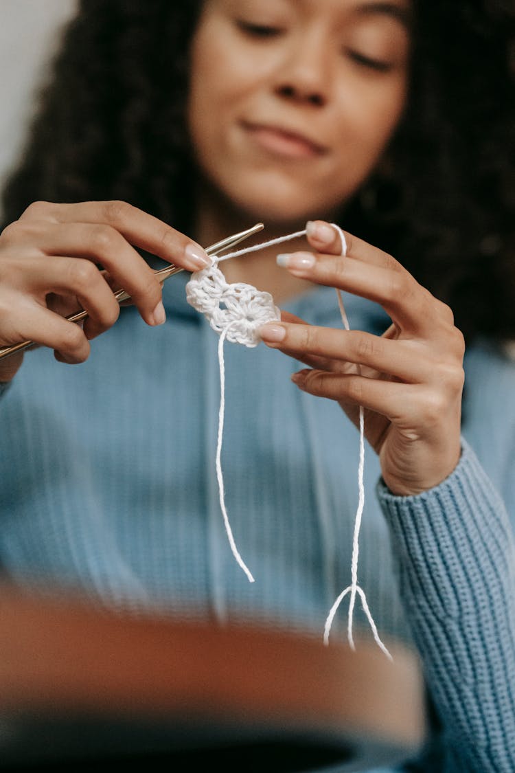 Close-up Of A Woman Crocheting