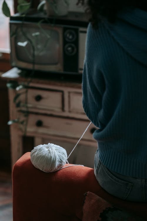 Close-up of a Ball of Yarn that Woman Uses to Crochet 