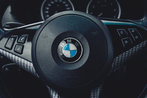 Free Close-up Photo of the BMW Emblem on Steering Wheel Stock Photo