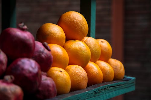 Selective Focus Photo of a Pile of Oranges