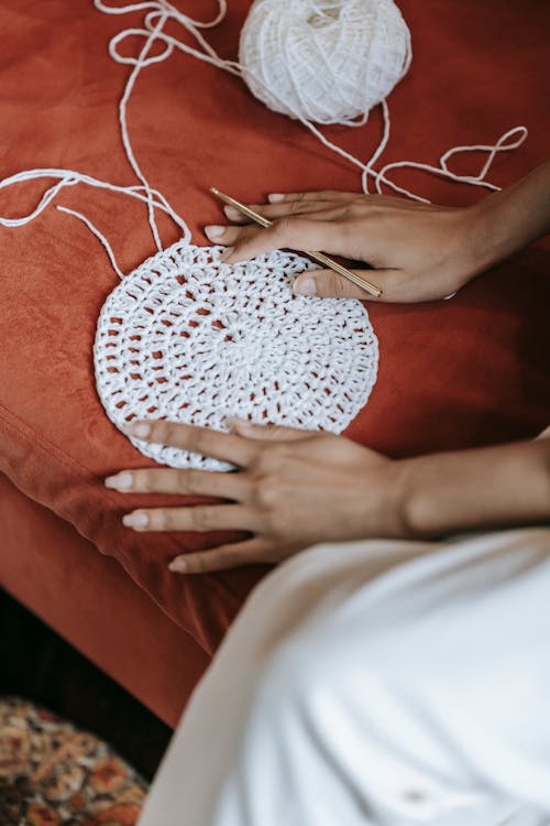 Hands of Woman with a Crocheted Item