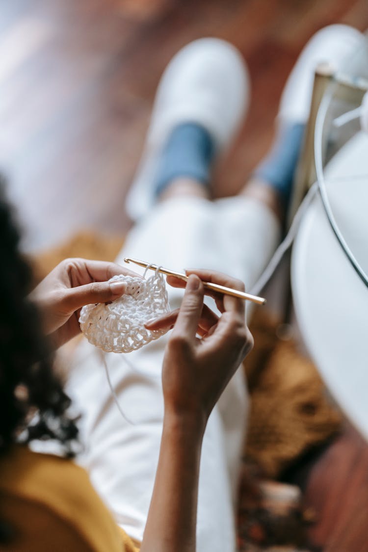 Close-up Of Woman Crocheting 