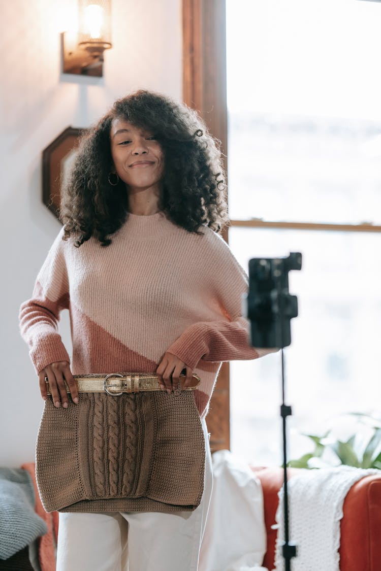 Smiling Black Blogger With Skirt Recording Video On Smartphone