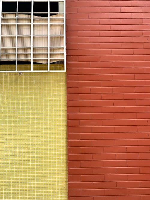 A Yellow Wall and Brick Wall