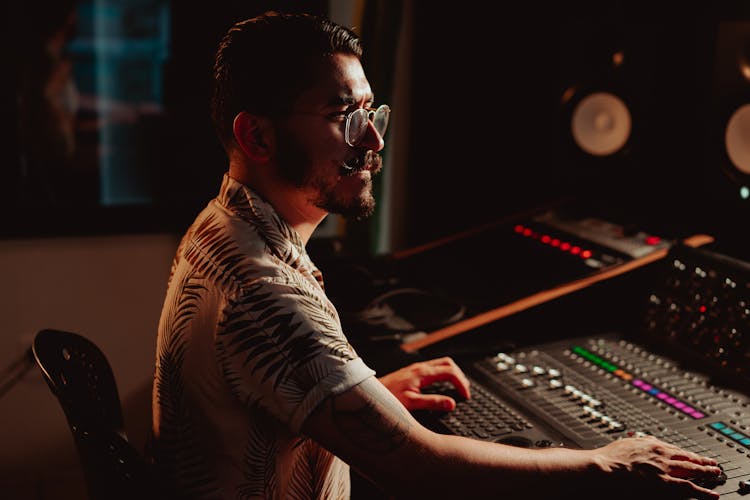 An Audio Engineer In A Recording Studio