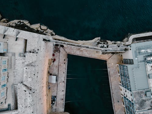 Aerial Shot of a Building Near the Ocean