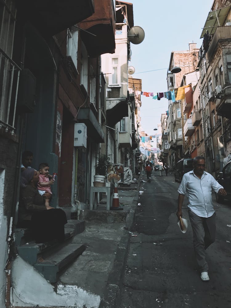 People Walking Near Old Buildings