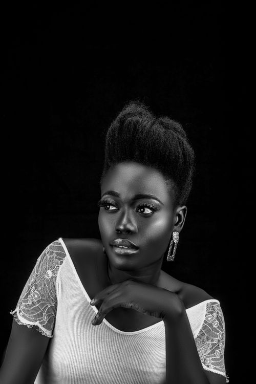 Free Stunning black and white portrait of a woman with elegant pose. Stock Photo