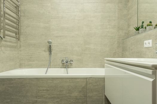 Modern bathroom wall tiles and fixtures, showcasing Melbourne bathroom renovation ideas.