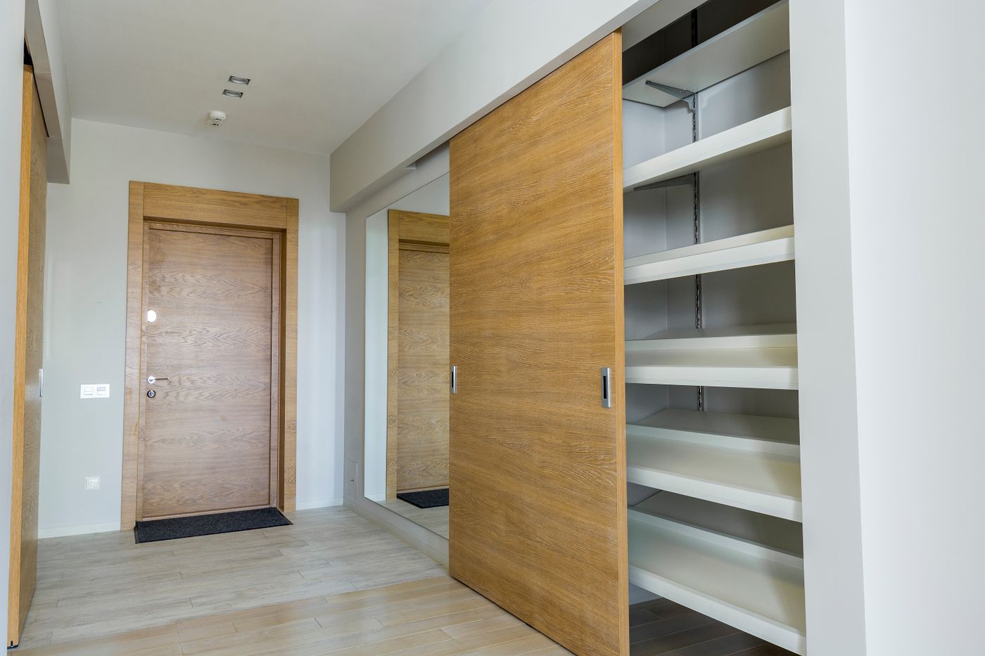 Walk in closet with sliding door