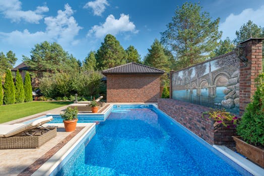 Brick house featuring a private swimming pool, garden, and mural painting for serene living.