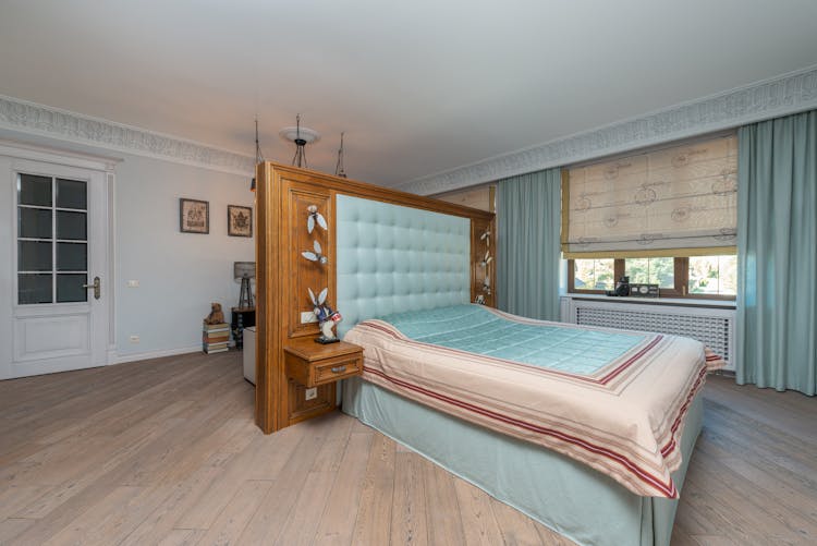 Bed With Wooden Headboard