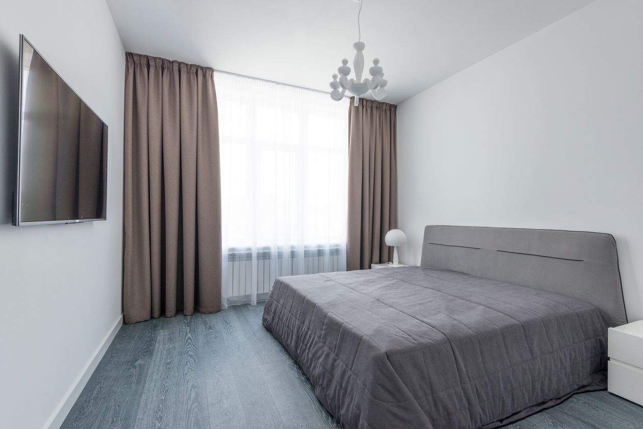 Blackout curtains in a bedroom window