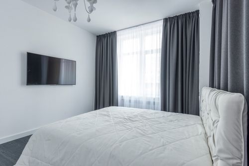 Pale bedroom corner, photo by Max Vakhtbovych on Pexels
