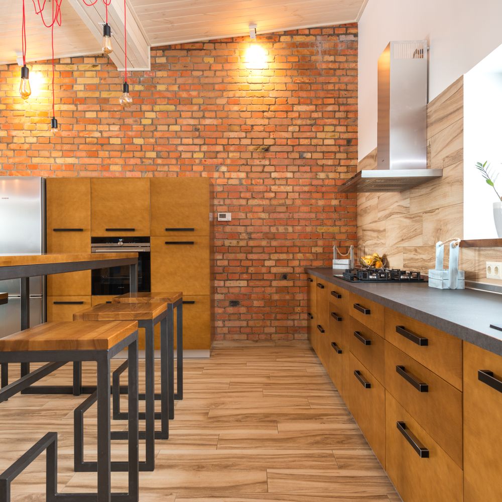 Kitchen Spraying in Old Oak Common — a decorator at work mid-project