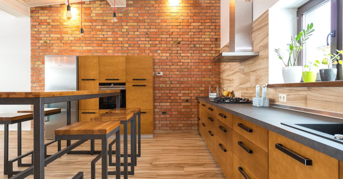 Kitchen with brick accent wall