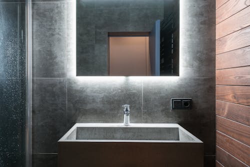Free A Mirror Above a Sink  Stock Photo