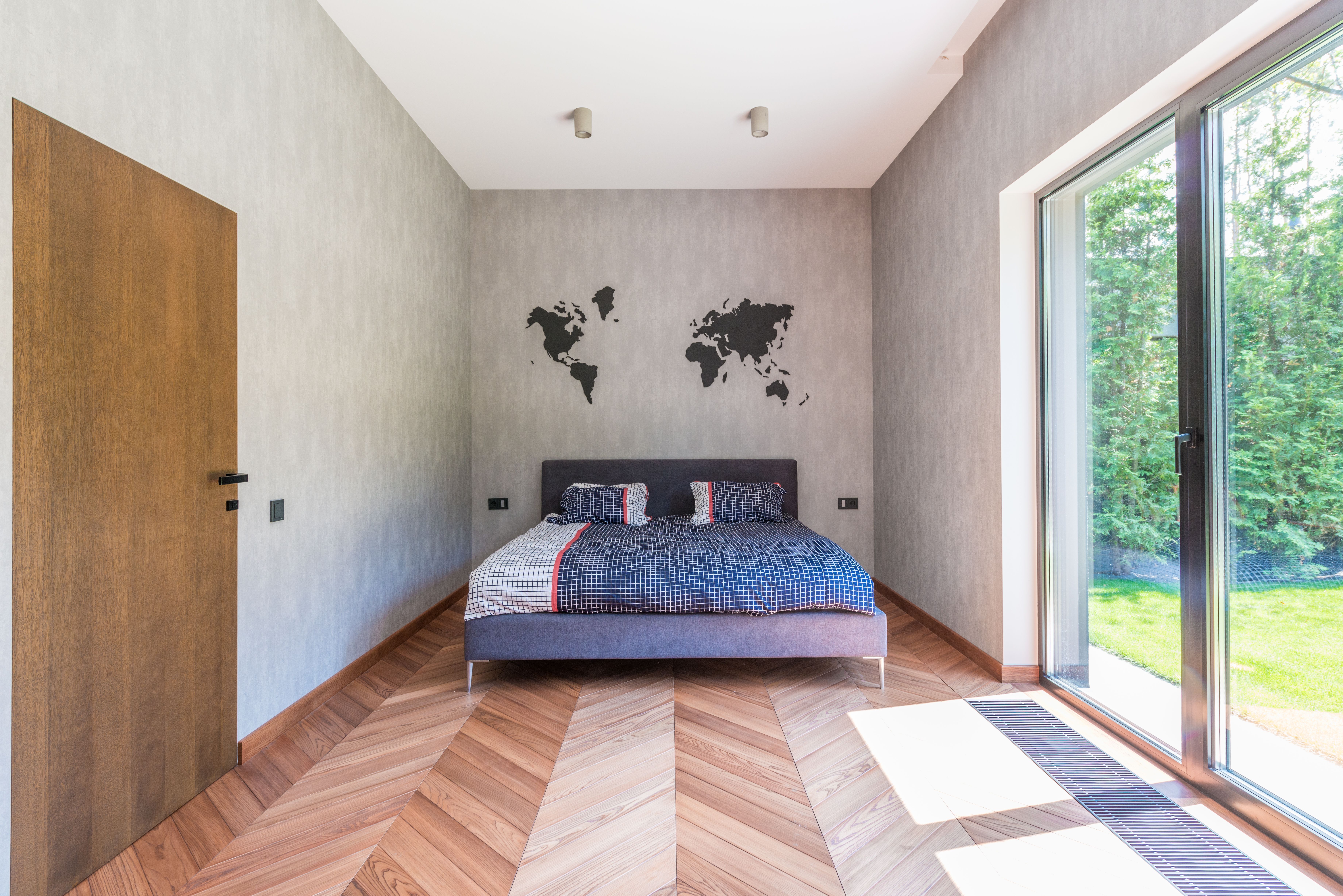 Wallpapering in Plaistow — careful masking before painting begins