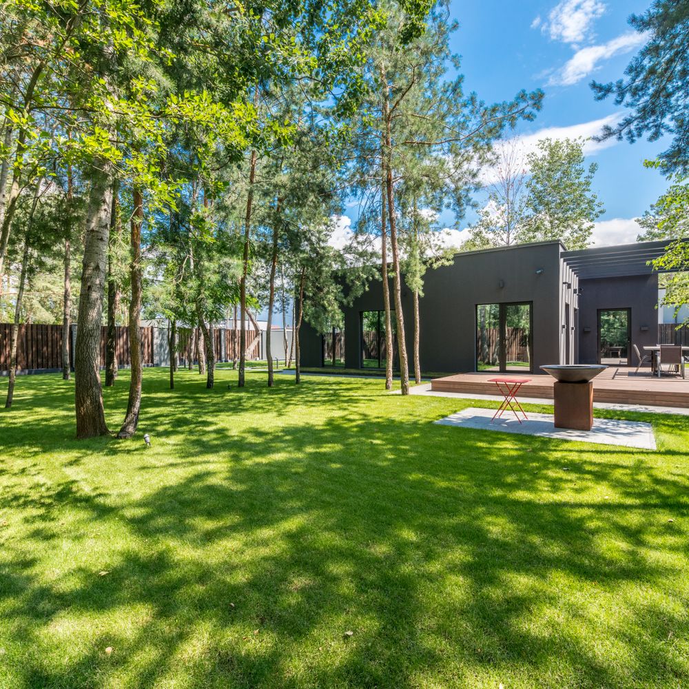 Fence and Decking Painting in Brunswick Park — surfaces prepped and cut in by hand