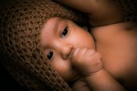 A Baby Sucking its Thumb