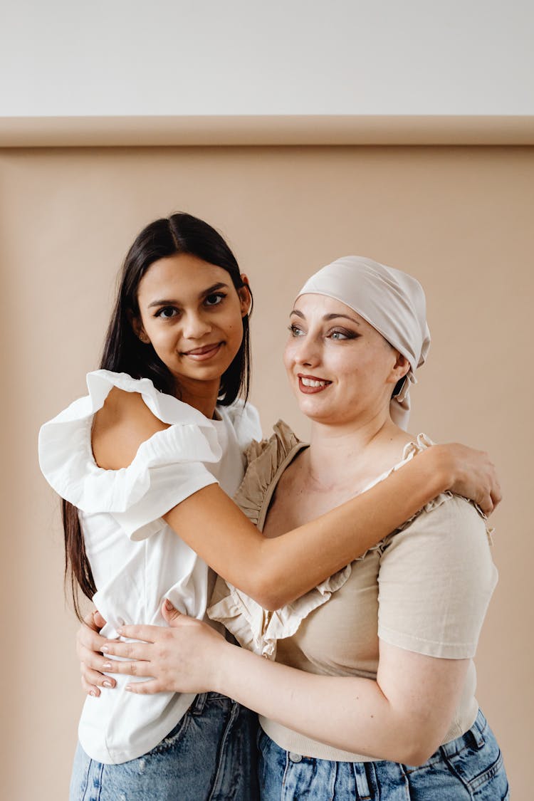 Studio Portrait Of A Mother And A Daughter