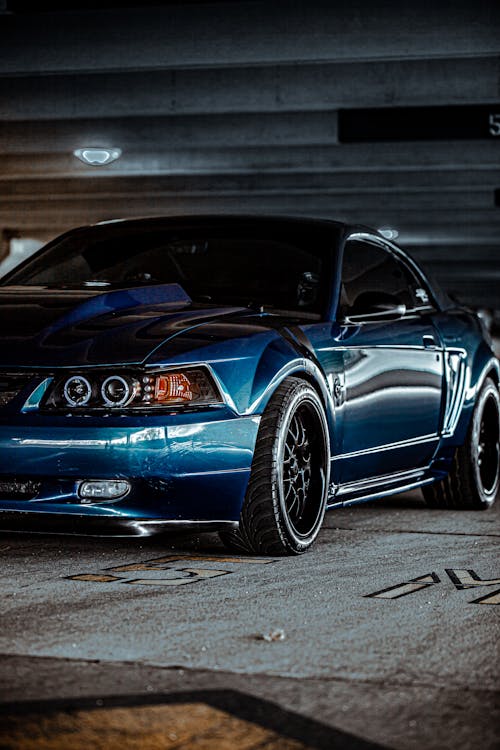 A Blue Car Parked in the Basement